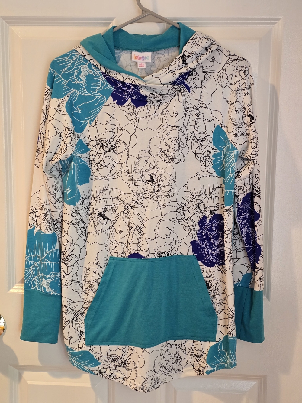 LuLaRoe Teal-Accented Garment with Multicolor Logo